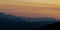 Sunset over the corsican mountains near saint florent ,corsica France , soft layered misty colours ,with copy space