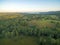 Sunset over countryside - aerial view.