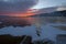 Sunset over crack Baikal ice