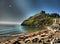 Sunset over Criccieth castle in North Wales in Gwynedde