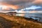 Sunset over a Fishing Shed on a Rocky Coast in Iceland