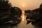 Sunset over a fishing village at Pantai Jeram, west coast of Malaysia