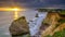 Sunset over Freshwater Bay towards Tennyson`s Monument, Isle of Wight