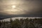 Sunset over a frozen Mooselookmeguntic Lake in Rangeley, Maine