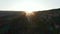 Sunset over geothermal rocky countryside in Iceland. Aerial View. Birds eye flying over icelandic stunning moonscape