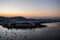 Sunset over Guanabara bay with city of Rio de Janeiro below with boats in the water from Sugarloaf Mountain in Rio, Brazil