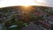 Sunset over homes aerial view