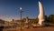 Sunset over the iconic fiberglass sculpture `Spirit of Sail` at the City Park of Kelowna