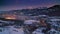 Sunset over illuminated Zakopane in winter, aerial view