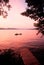 Sunset over Lake Winnipesaukee, NH with canoe