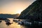 Sunset over Liguarian sea. Boats anchored in Vernazza. View of nature in Cinque Terre