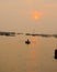 Sunset over lone rowboat, Vietnam