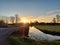 Sunset over meadows at the lowest polder in the Netherlands Zuidplaspolder between Gouda and Rotterdam