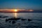 Sunset Over The Mediterranean Sea At The Beach Of The City Porec In Croatia
