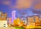 SUnset over Miami Florida skyline with illuminated modern buildings