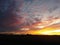 sunset over midwest farm