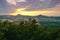 Sunset over Milesovka hill when viewed from Lovos hill in PLA Czech central mountains