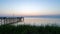 Sunset over Mobile Bay on the Alabama Gulf Coast seascape at Daphne Bayfront Park Pavilion pier