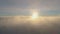 Sunset over moving fog. Antarctic aerial shot.