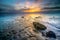 Sunset over the mud flats of the he Wadden Sea National Park, UNESCO World Heritage Site in epic twilight at low tide