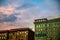 Sunset over old brick city apartment buildings