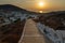 Sunset over the old town of Chora. Folegandros Island, Greece.