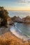 Sunset over the Pacific Ocean and McWay Falls in Big Sur, California