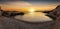 Sunset over a pebble beach on Koufonisia Islands, Cyclades