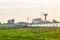 Sunset over a photovoltaic power plant with photovoltaic modules for renewable energy on the field. Solar power generation