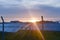 Sunset over a photovoltaic power plant with photovoltaic modules for renewable energy on the field. Solar power generation