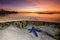 Sunset over the Reef, a starfish sits below the surface