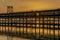 Sunset over the Rio Tinto Pier, Huelva, Andalusia, Spain