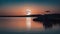 sunset over the river A blue moon over water, representing the calmness and the serenity of water. The moon is soft