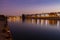 Sunset over the river Guadalquivir in downtown Seville and the fishers neighbourhood of Triana