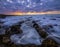 Sunset over the rocky, atlantic beach