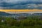 Sunset over the rolling hills in the south of Limburg, with ion the horizon a view on the former cement factory in Maastricht