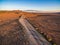 Sunset over rural highway passing through South Australian desert.