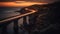 Sunset over the Sea cliff bridge along Pacific ocean coast with lights of passing cars near Sydney. Generative Ai