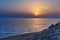 Sunset over the sea on wild beach of Persian gulf coast. Iran