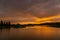 Sunset over a small lake in summer in Bashkiria