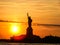 Sunset over Statue of Liberty