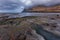 Sunset over the steep coast in Eysturoy Island. Faroe Islands