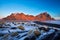 Sunset over the Stokksnes Mountain on Vestrahorn Cape with Snow in Iceland