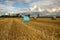 Sunset over the Swedish landscape with rolled grass