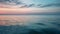 Sunset over tranquil seascape, nature beauty reflected generated by AI