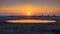 Sunset over the waterhole of Okaukuejo Camp in Etosha, Namibia