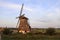 Sunset over the windmills molenviergang of the Tweemanspolder in Zevenhuizen