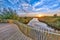 Sunset over Wooden Balustrade on bridge