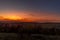 Sunset overlooking nature and landscape from Brno hill sunset couple of moments before sunset orange color with clouds moving in