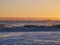 Sunset upon the Pacific ocean, kelp and sea birds, Orange and yellow sky. Boundless waters.